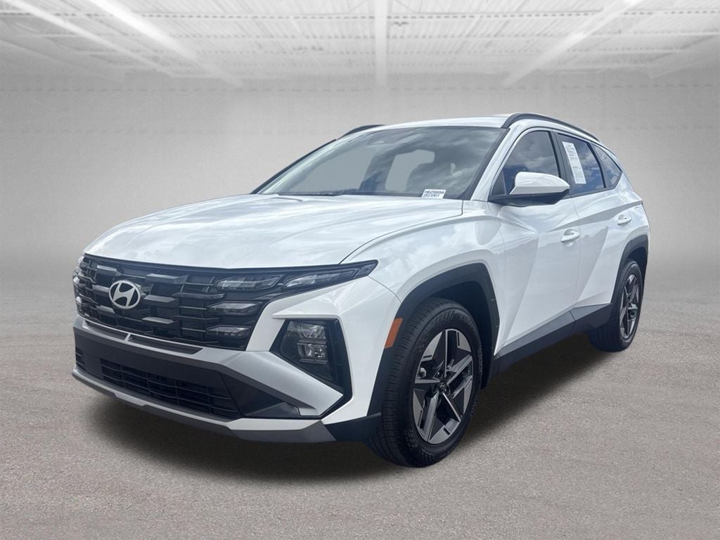 2025 Hyundai TUCSON SEL in White Pearl — front three-quarter view