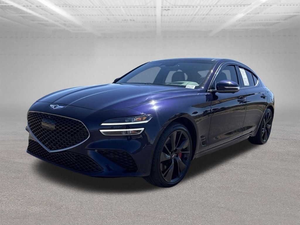 2023 Genesis G70 3.3T in Capri Blue — front three-quarter view