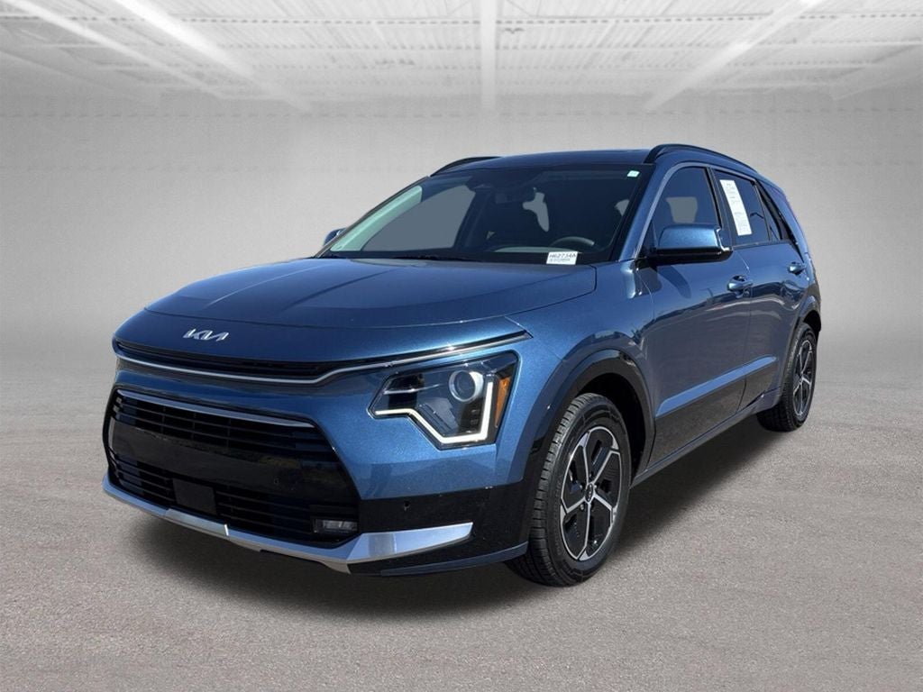 2024 Kia Niro SX in Mineral Blue — front three-quarter view